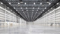 a large warehouse with a lot of lights in it