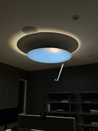 a ceiling lamp with a light on it